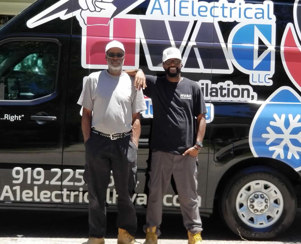 a1teamtruck William Taylor Sr. and Jr. Standing Outside A1 Electrical HVAC Service Truck.